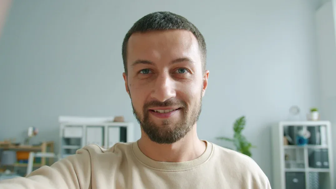 A presenter on a LookSuite call with a branded lower third